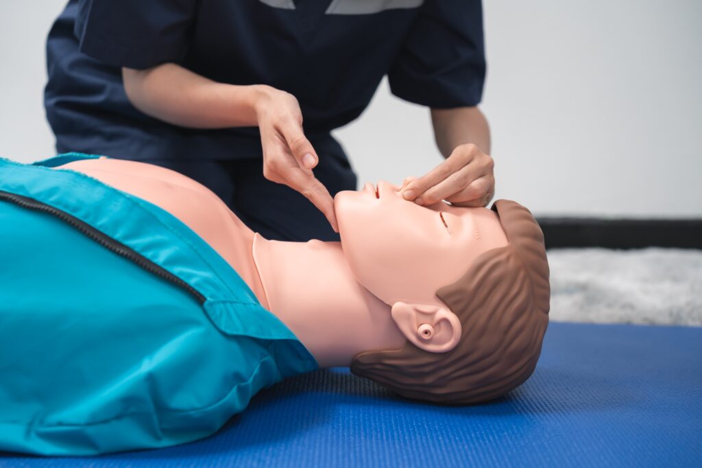 CPR Training ,Emergency and first aid class on cpr doll, Cardiopulmonary resuscitation